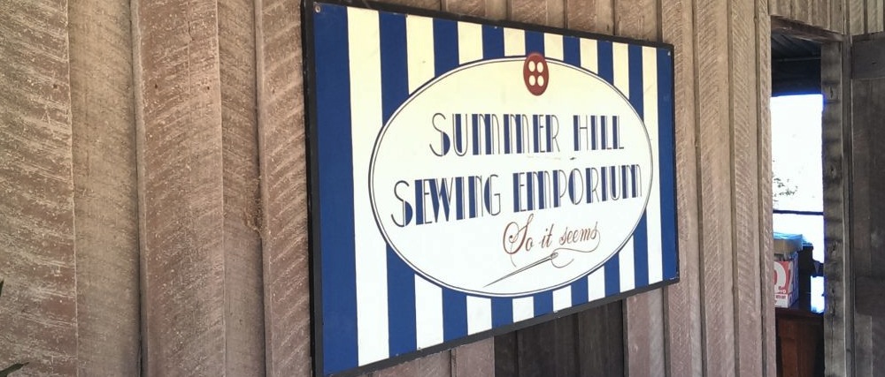 Signage on the sheds at the Sewing Emporium.